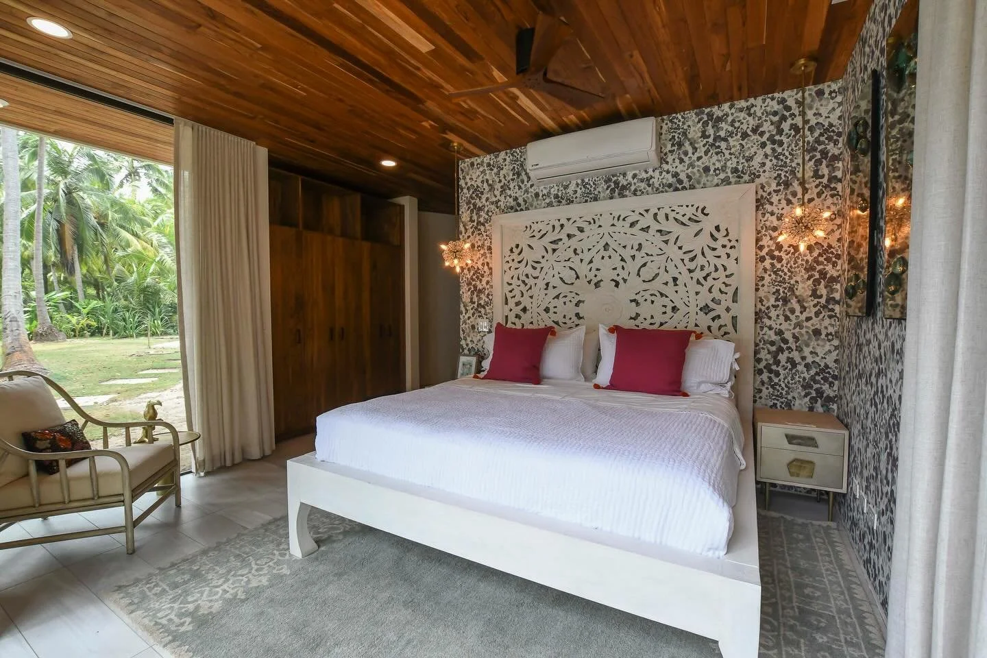 A tropical modern beach home designed to feel as good as it looks. Warm woods, sensual color, and an effortless connection to its surroundings create a space that invites you to slow down and stay awhile.

This is what happens when architecture, mate