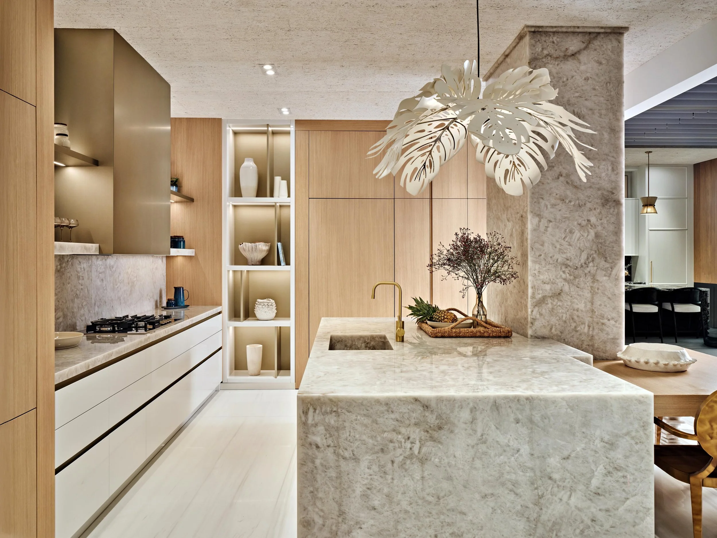 A kitchen should feel as personal as it is functional. Layered materials, sculptural details, and warmth throughout create a space designed for living, gathering, and making memories.

#ErrezDesign #BiographicalDesign #KitchenDesign #MiamiMaximalism 