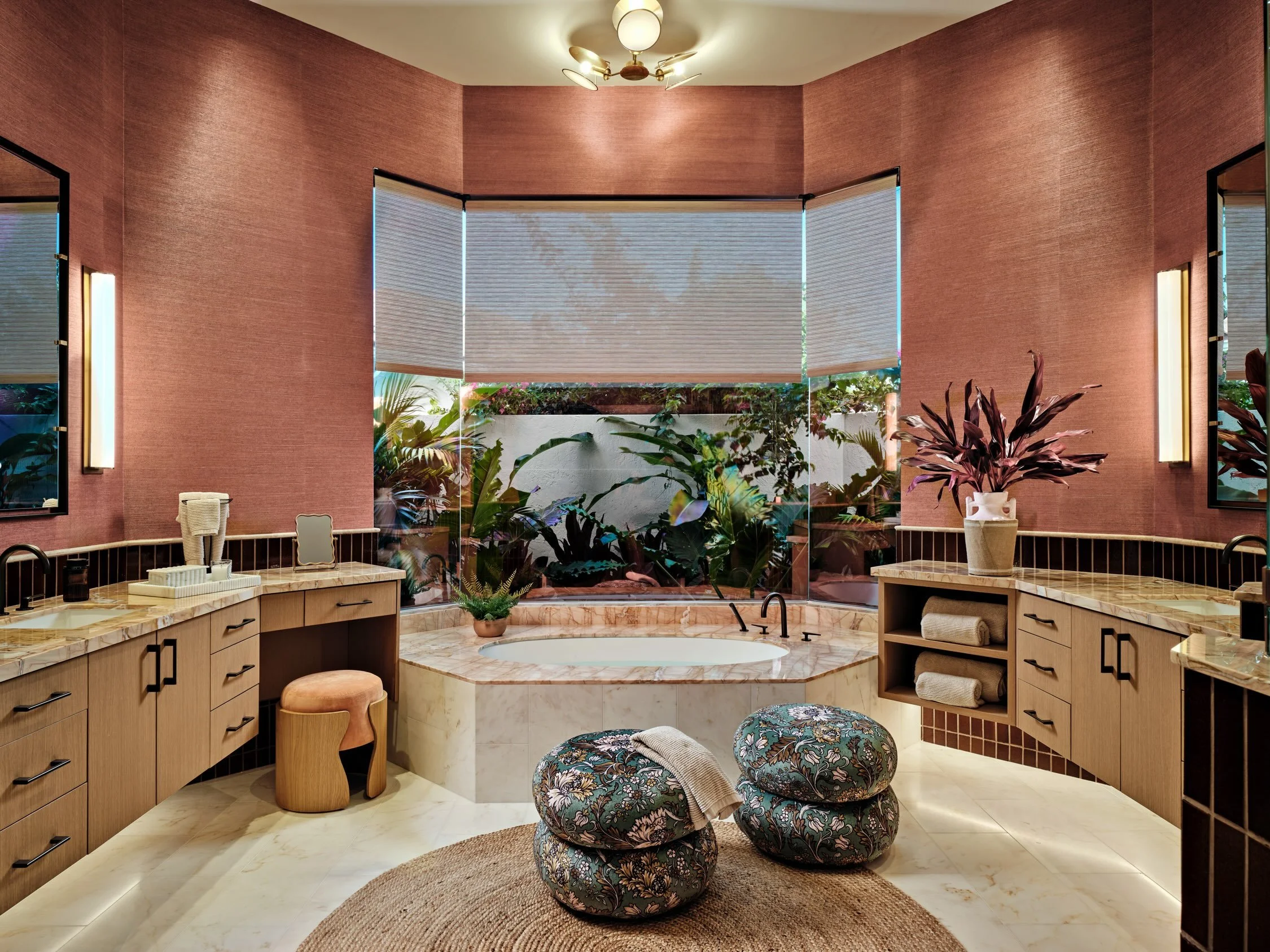 Rust, but make it refined. 🤎

Layers of rich color, graphic wallpaper, dimensional tile, natural stone, and sculptural lighting come together to create a bathroom that feels warm, collected, and completely unexpected. Proof that even the most functi