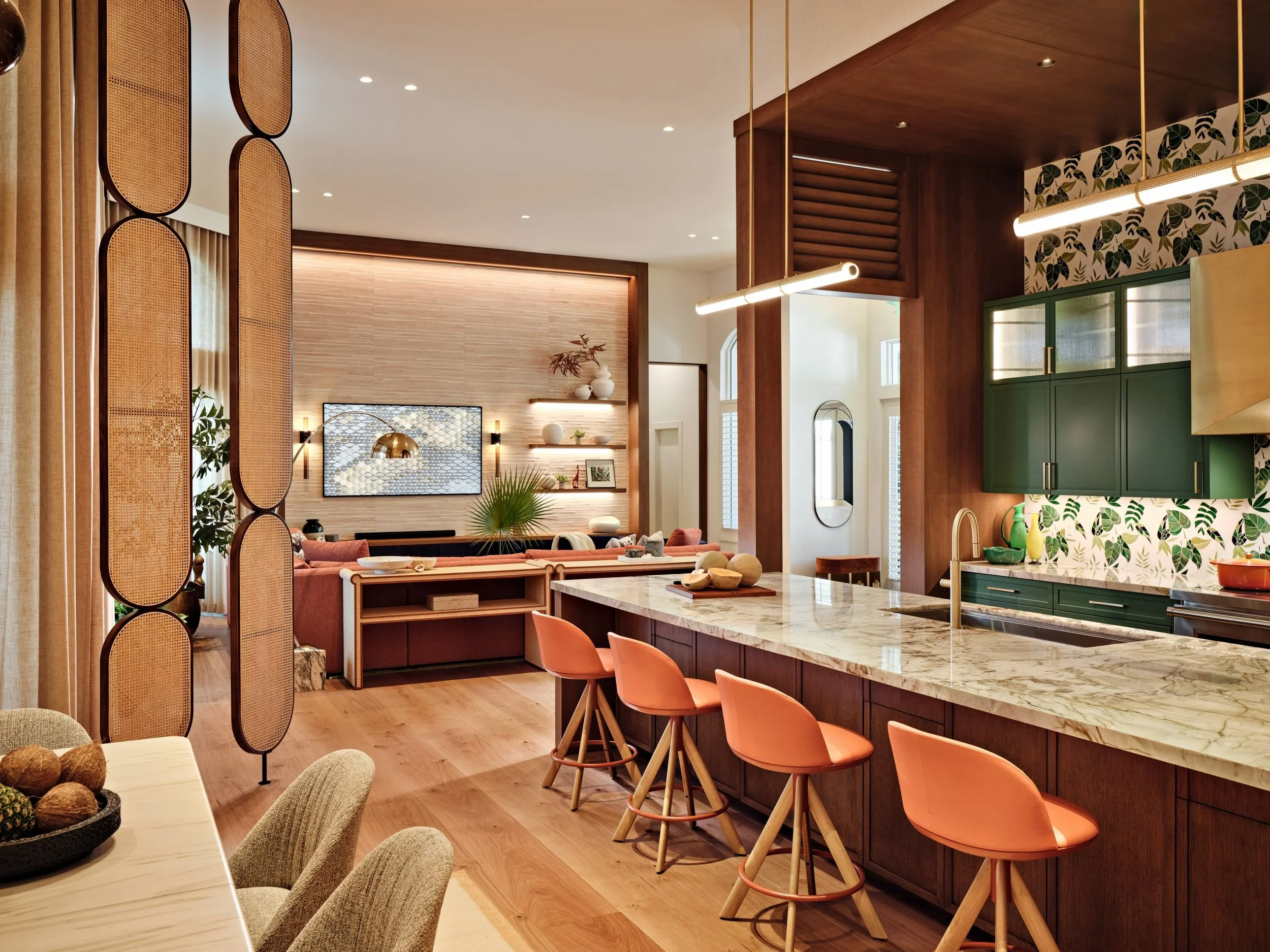 A little tropical, a little mid-century, and a lot of personality. Rich woods, lush greens, playful coral accents, and sculptural details come together in a home where every element has something to say. Who says sophistication has to be serious?

#E