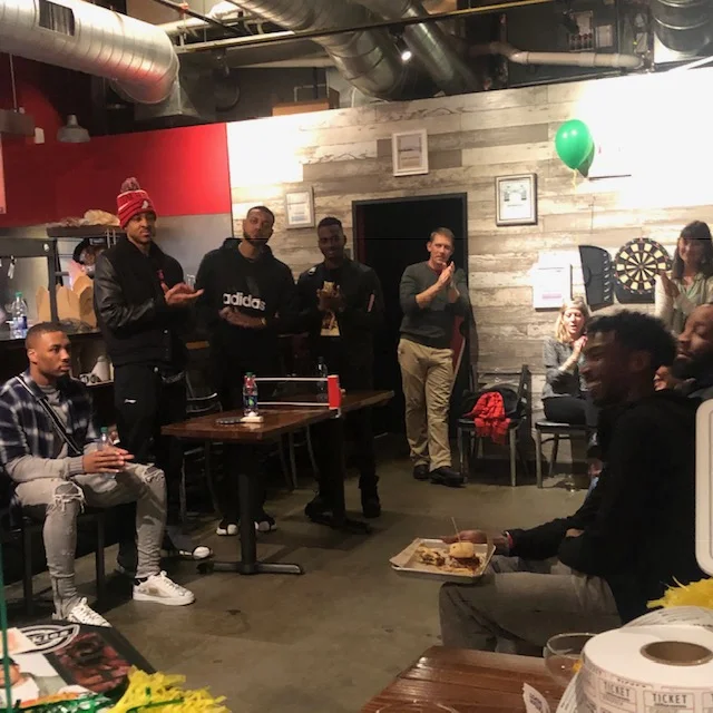 NBA All-Star Damian Lillard and teammate CJ McCollum stop by to show their support for Coach Campbell at the fundraising party