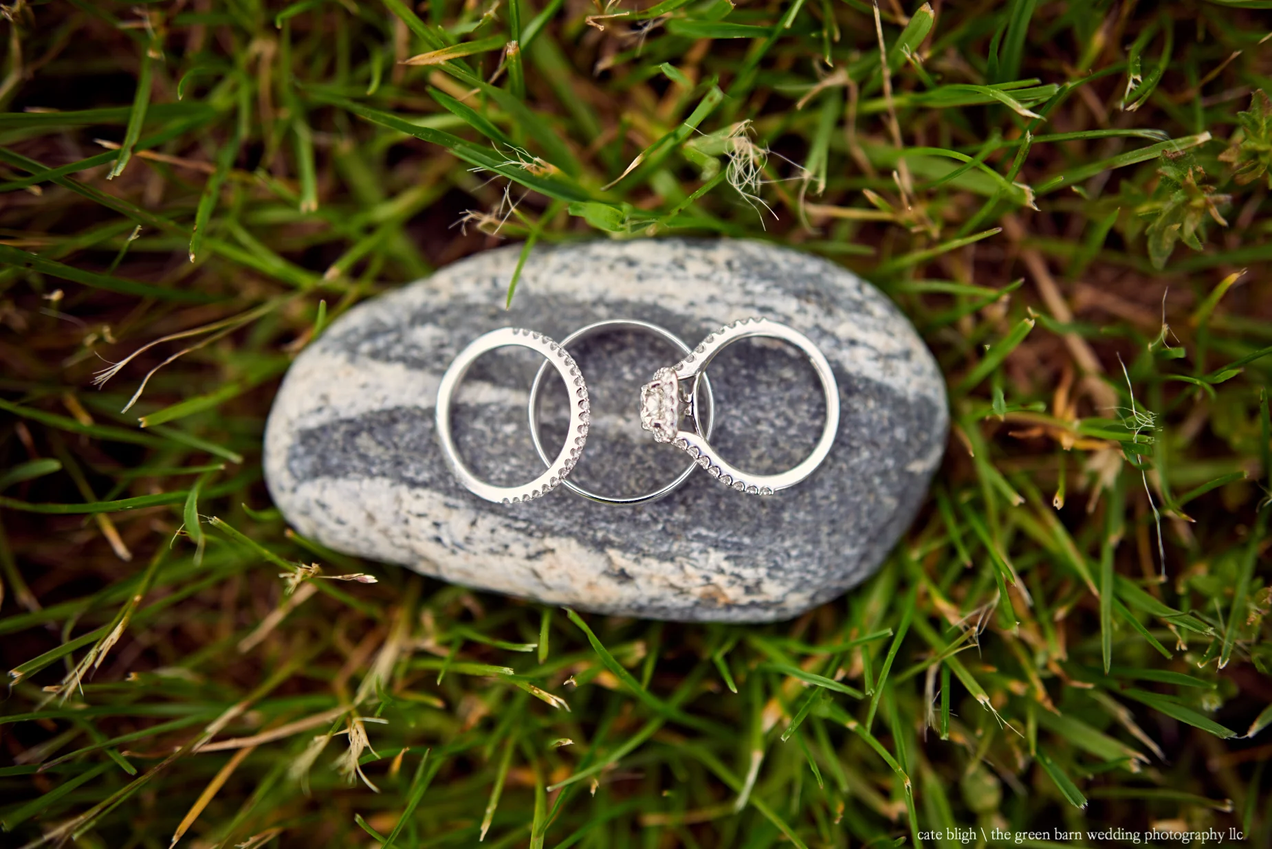Wedding rings on smooth rock seacoast wedding inspiration