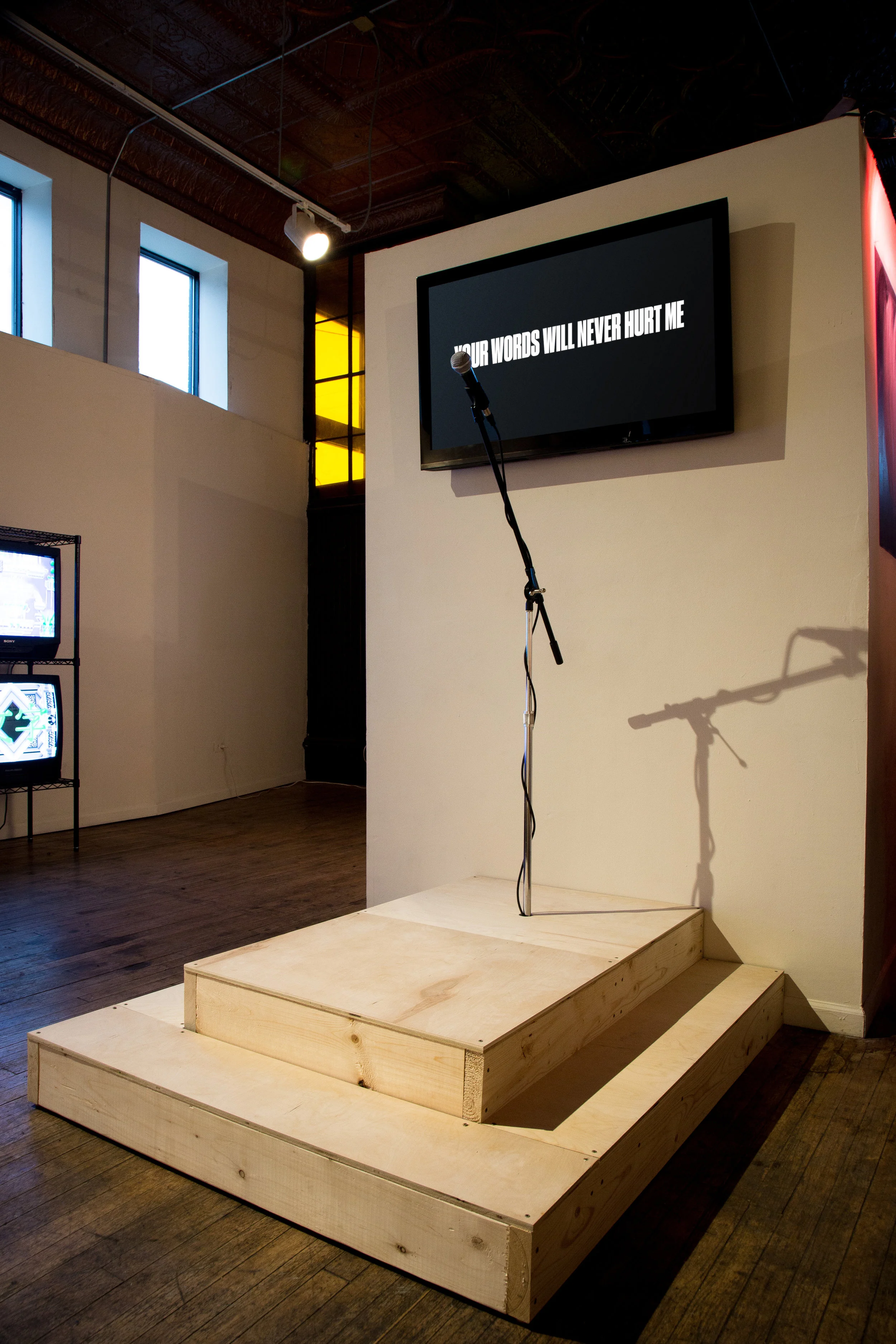  As viewers engage—leveraging a microphone to respond to a digital typographic prompt—the negative effect of harsh, critical, and hurtful language takes a physical toll on the typography, as it crumbles before the participant’s eyes. 