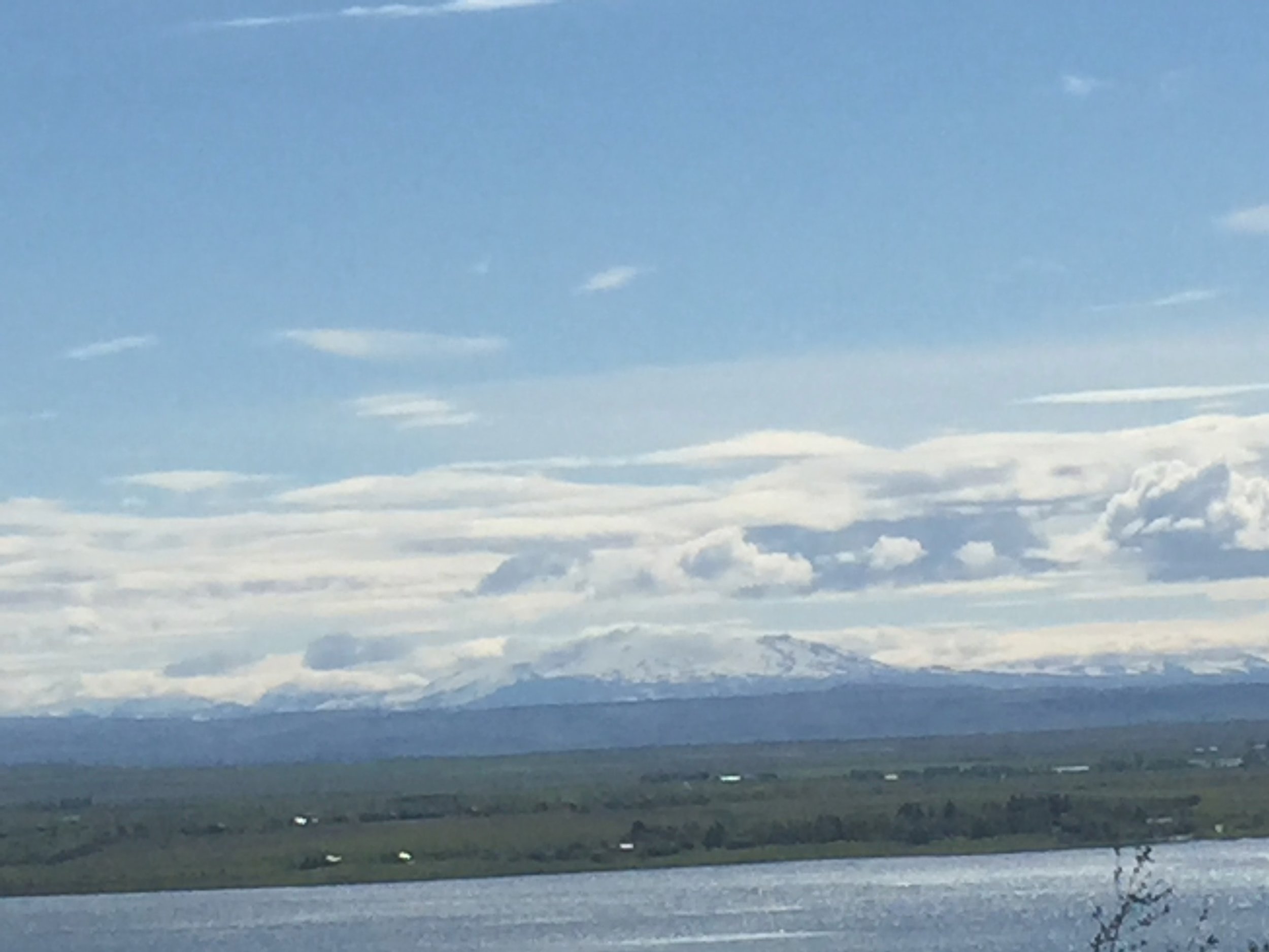 View from Studio across Lake at Laugarvatn. Rare sighting of Hekla without cloud-cover. Also due to erupt any time!