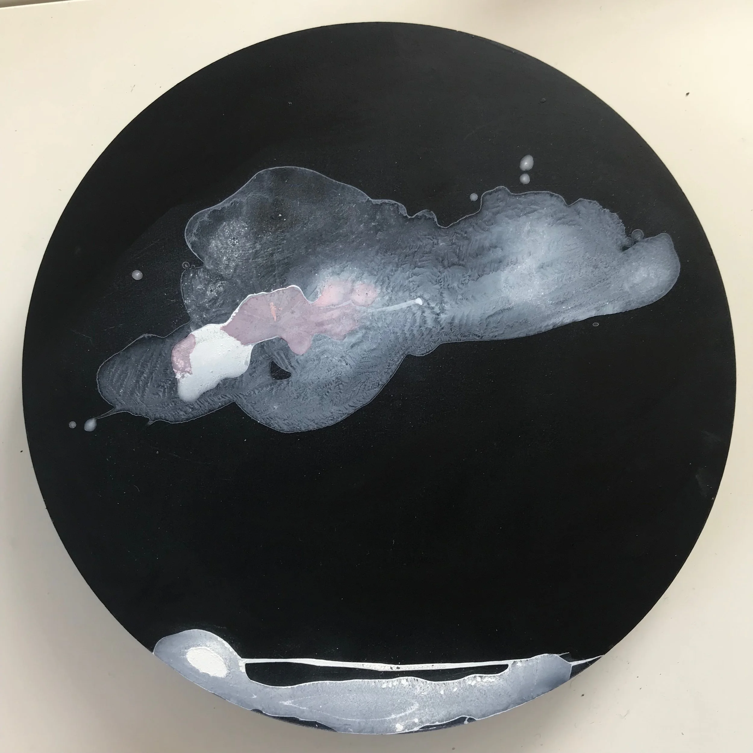 White Ink on wood. 9" diameter (22cm)