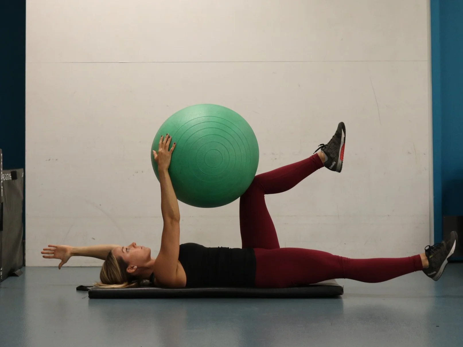 Extend left arm and right leg