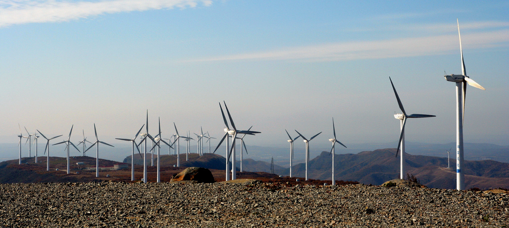 Carbon offset programs can include renewable energy sources, like this wind farm, or other programs like reforestation and energy capture. Photo from Flickr