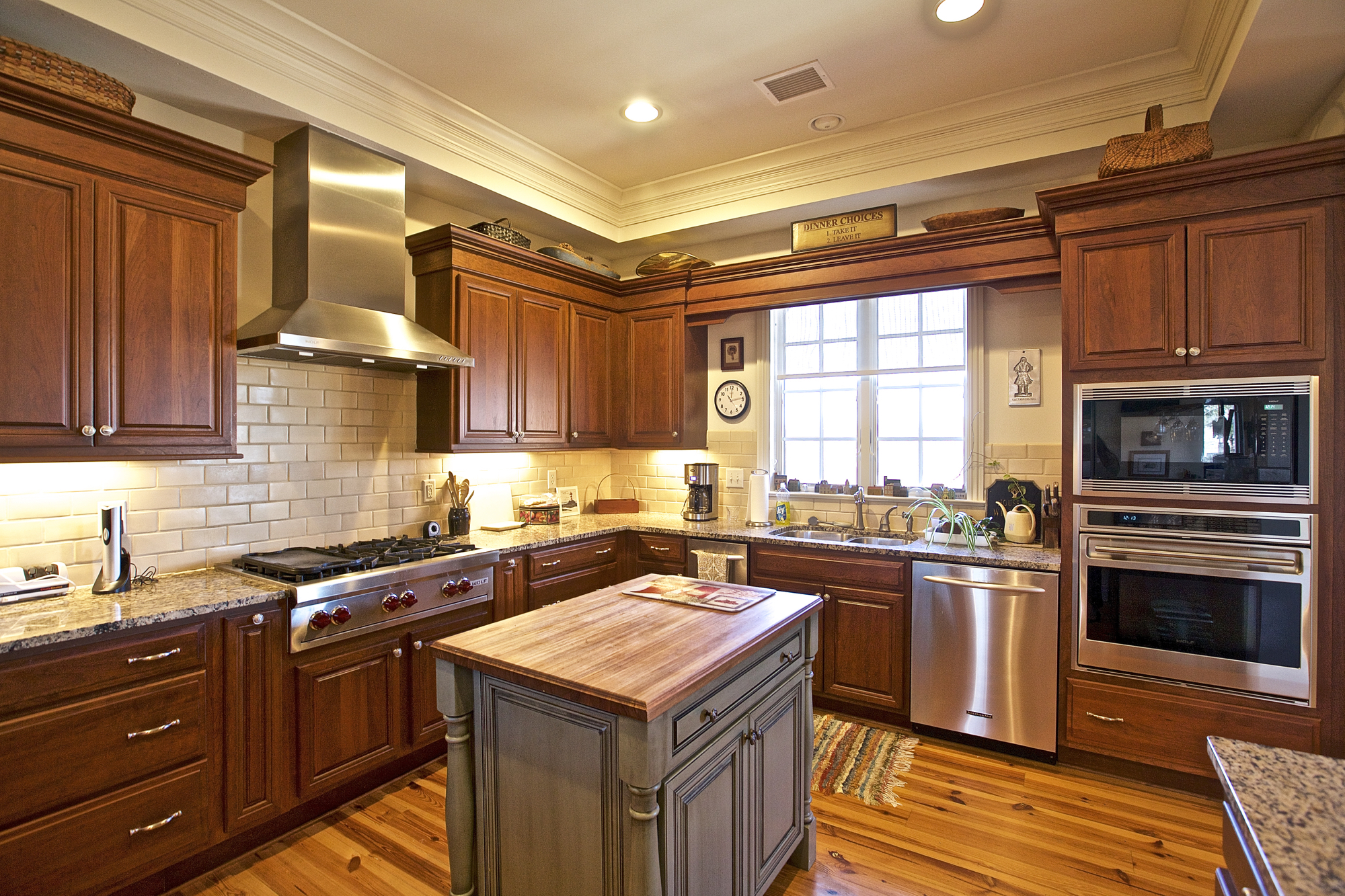 Wolf & Viking appliances plus wine fridge in the gourmet kitchen