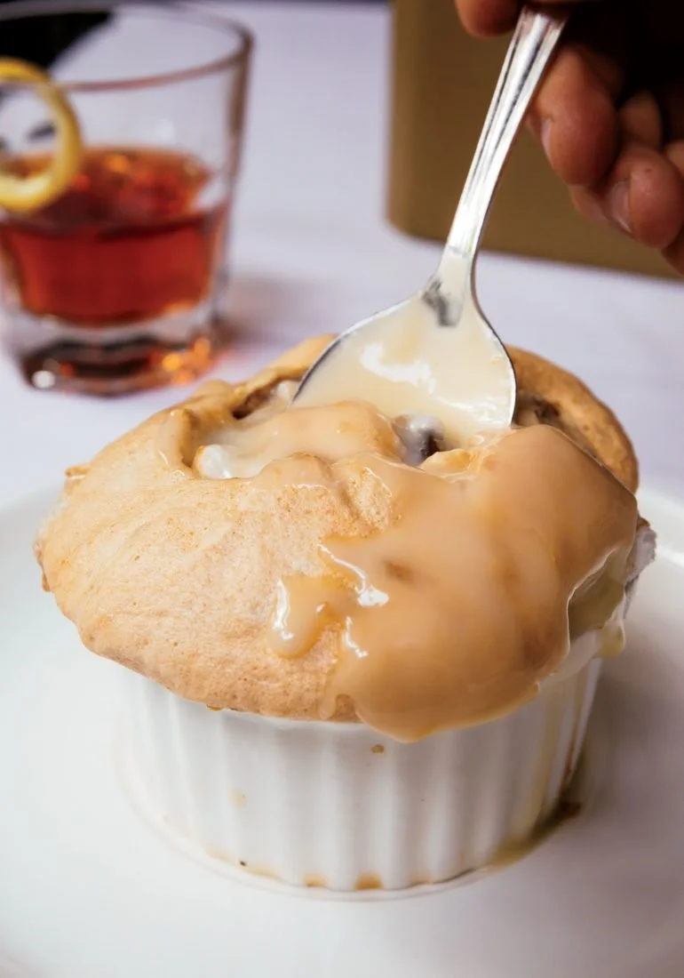 Bread Pudding Soufflé with Whiskey Sauce at Commander’s Palace in New Orleans