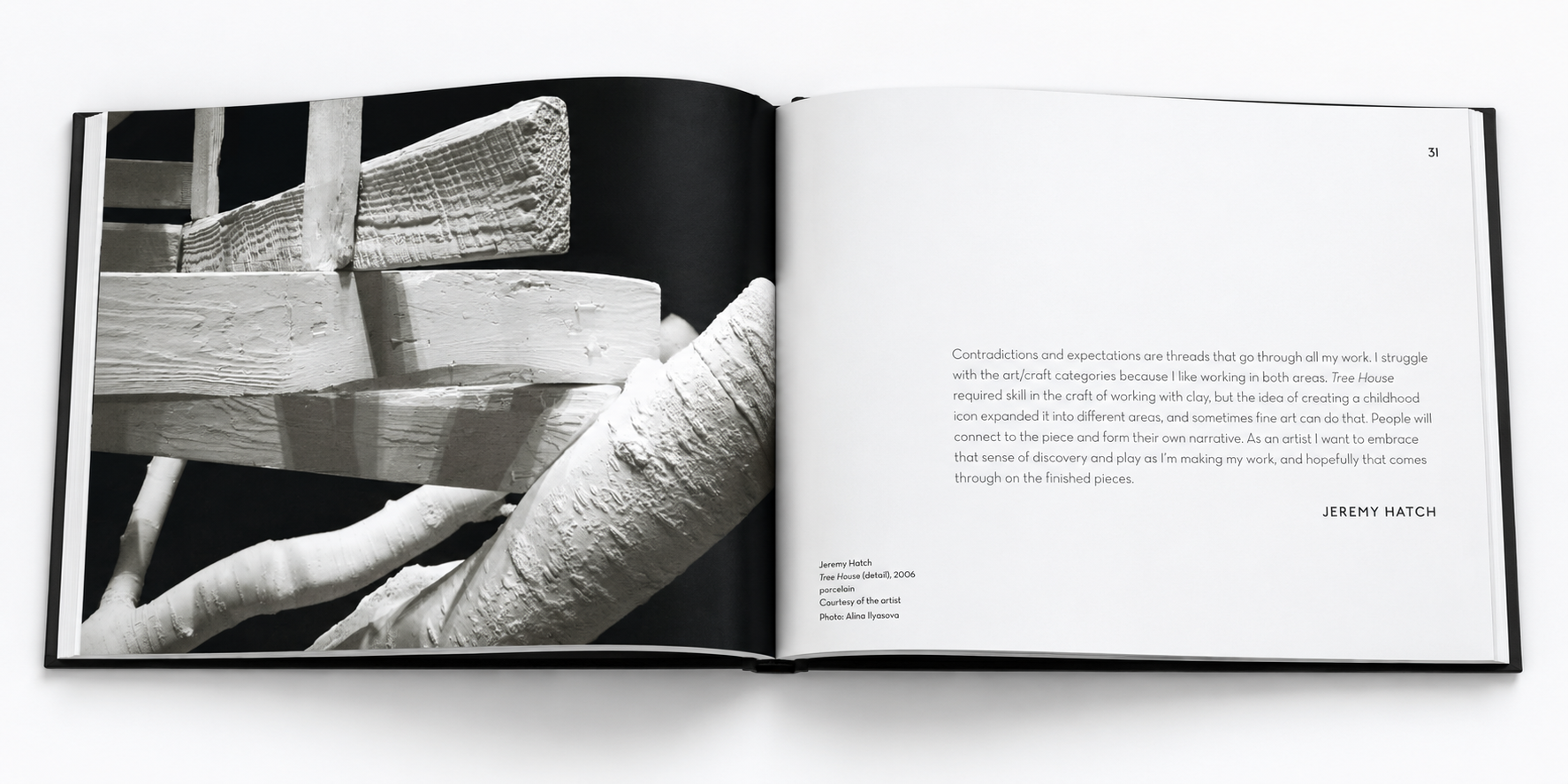 Open black portfolio with porcelain branches-6.png
