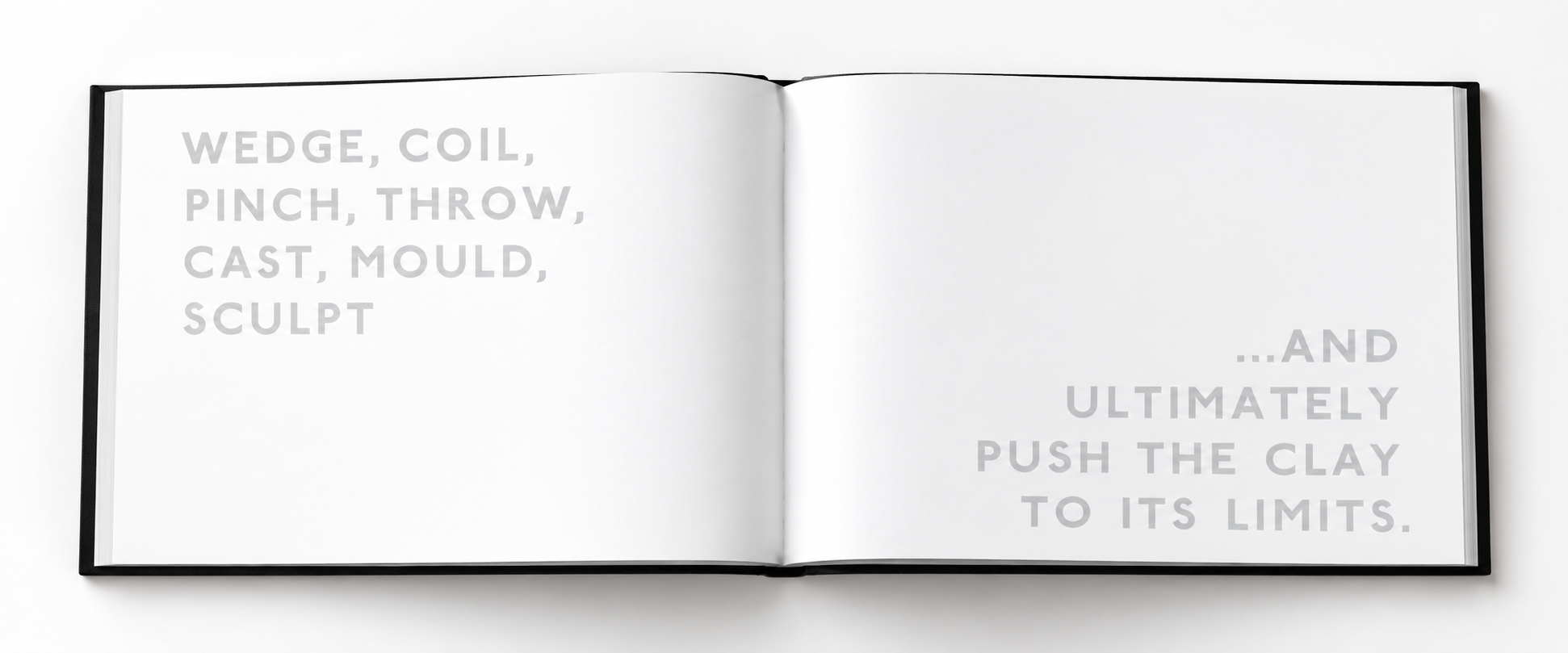 Open black hardcover with pale gray typography-7.png