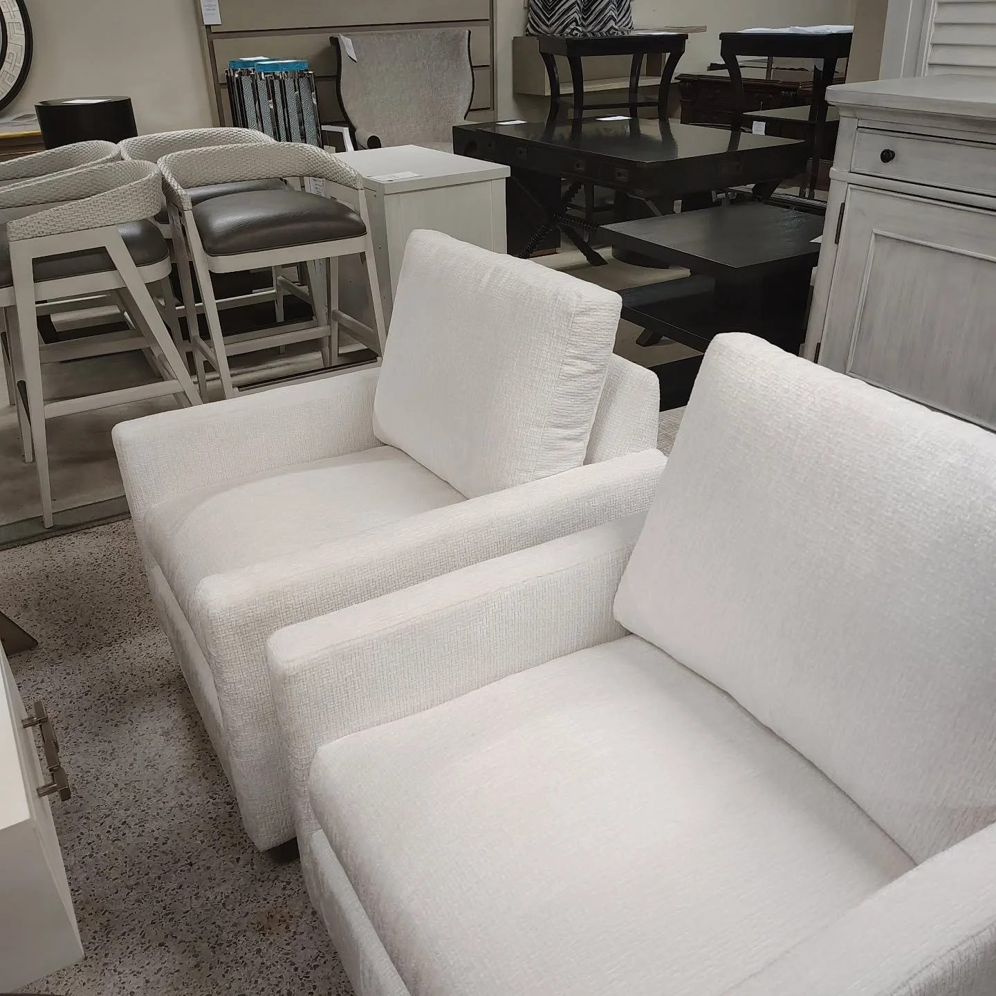 Beautiful white swivel chairs received today