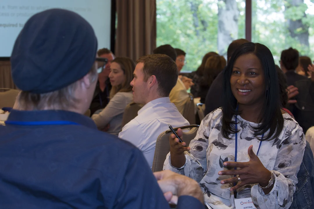 Pictured: Justina Nixon-Saintil , Verizon, Fellow since 2013 speaks with Carsten Tams , emagence, Fellow since 2016