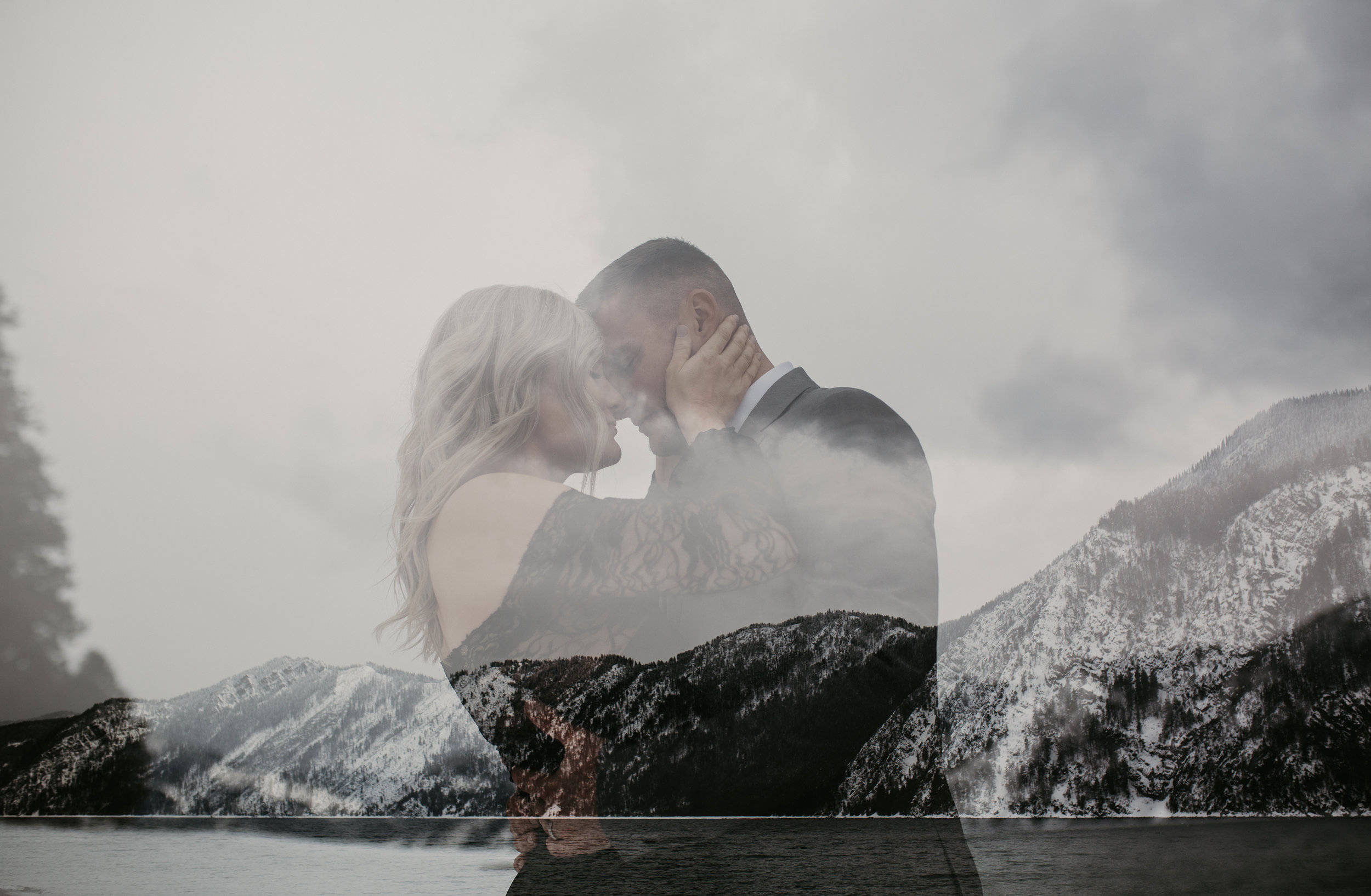  Bride and Groom holding each other in the snow during wedding adventure session 