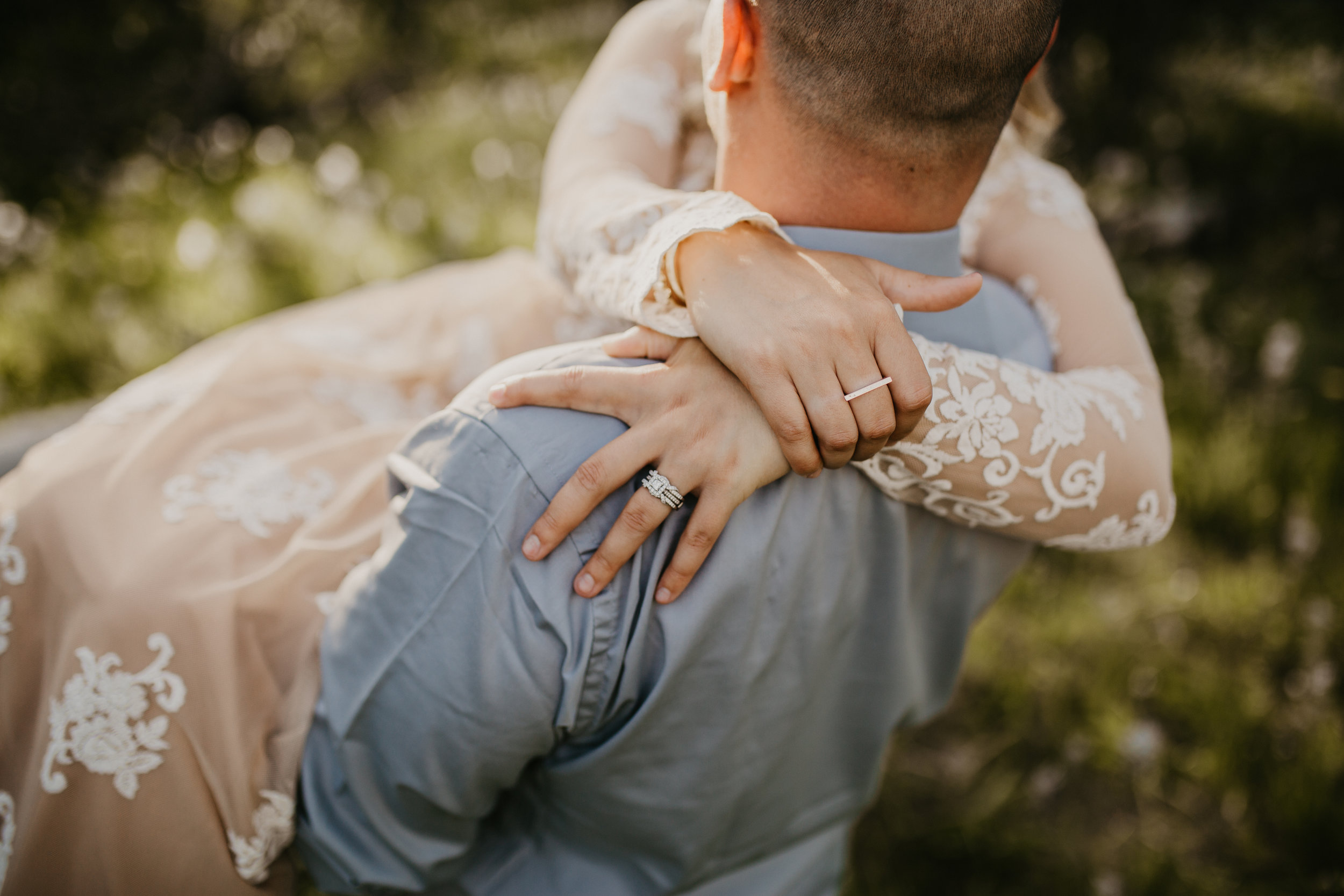  Groom holding his bride during engagement session in North Idaho 