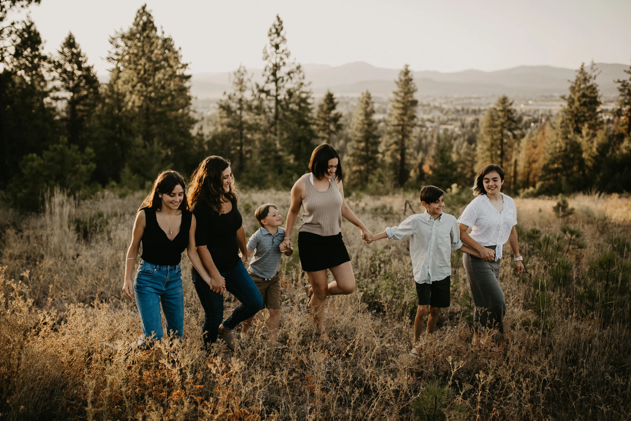 Family posing with their child during a Family Shoot in the Pacific Northwest