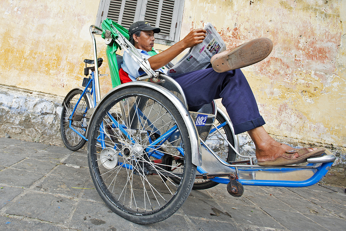 12.   Vietnamise Peddi Cab Driver.jpg