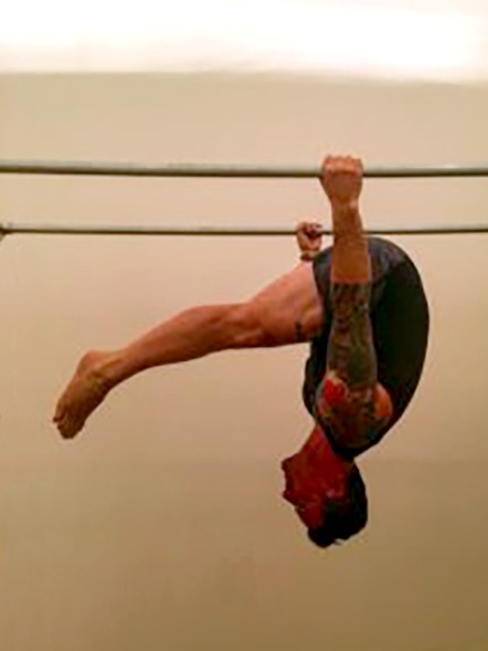 Seamus Mullen hanging working out in the gym