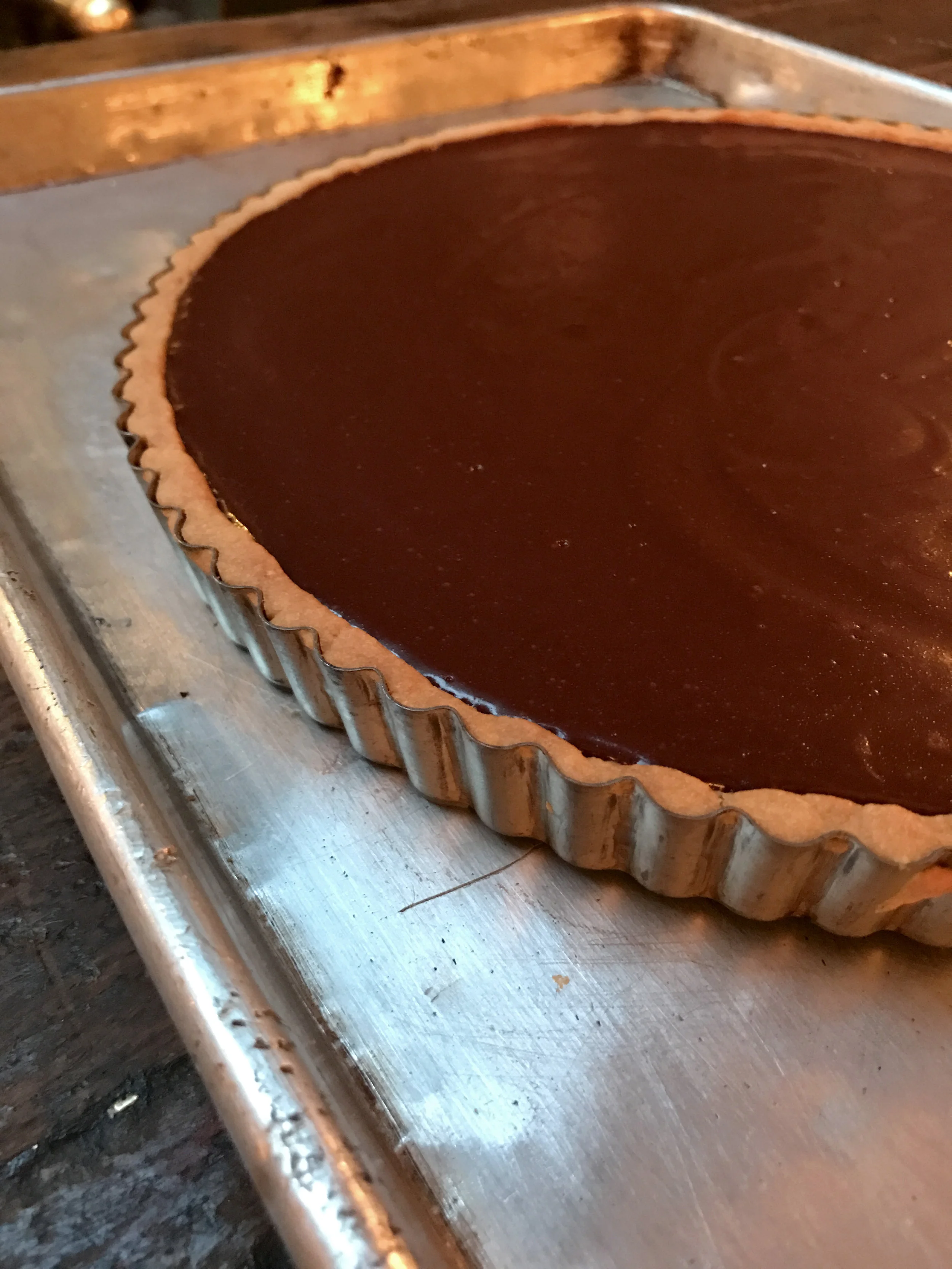 gluten free Dark Chocolate and Date Ganache with Coconut-Macadamia Crust and Whipped Kefir