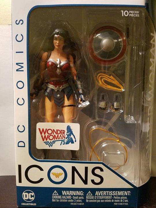 The Packaging is nice in clean with a sticker celebrating Diana's 75th anniversary. You can also see all of her accessories. She comes with two extra hands, one closed and one open lasso, and her shield and sword.