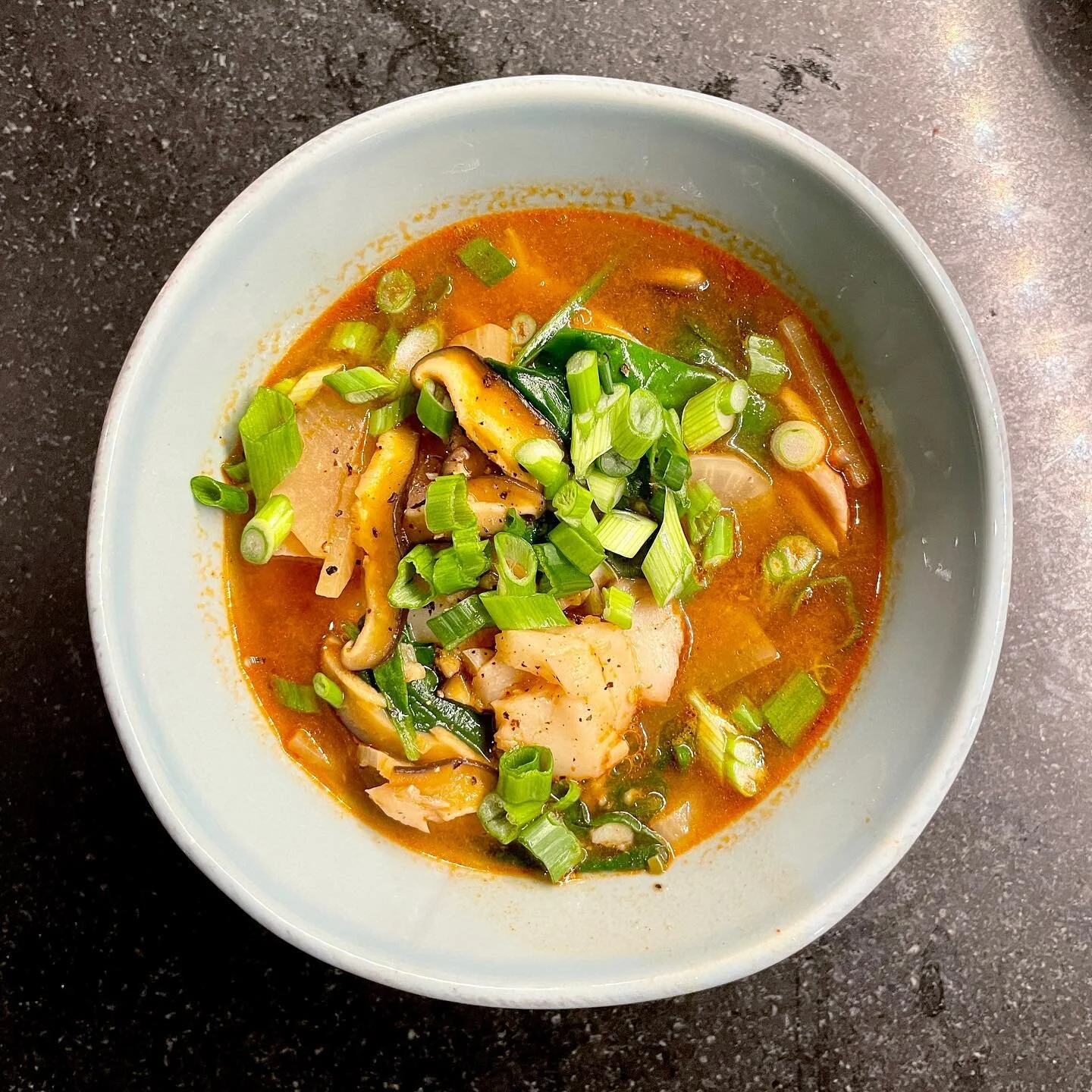 Tonight&rsquo;s lesson: #gochujang is delicious af. It&rsquo;s a Korean fermented chili paste that was mixed in with the broth to make this spicy Korean-style fish stew. 👨🏼&zwj;🍳👨🏻&zwj;🍳