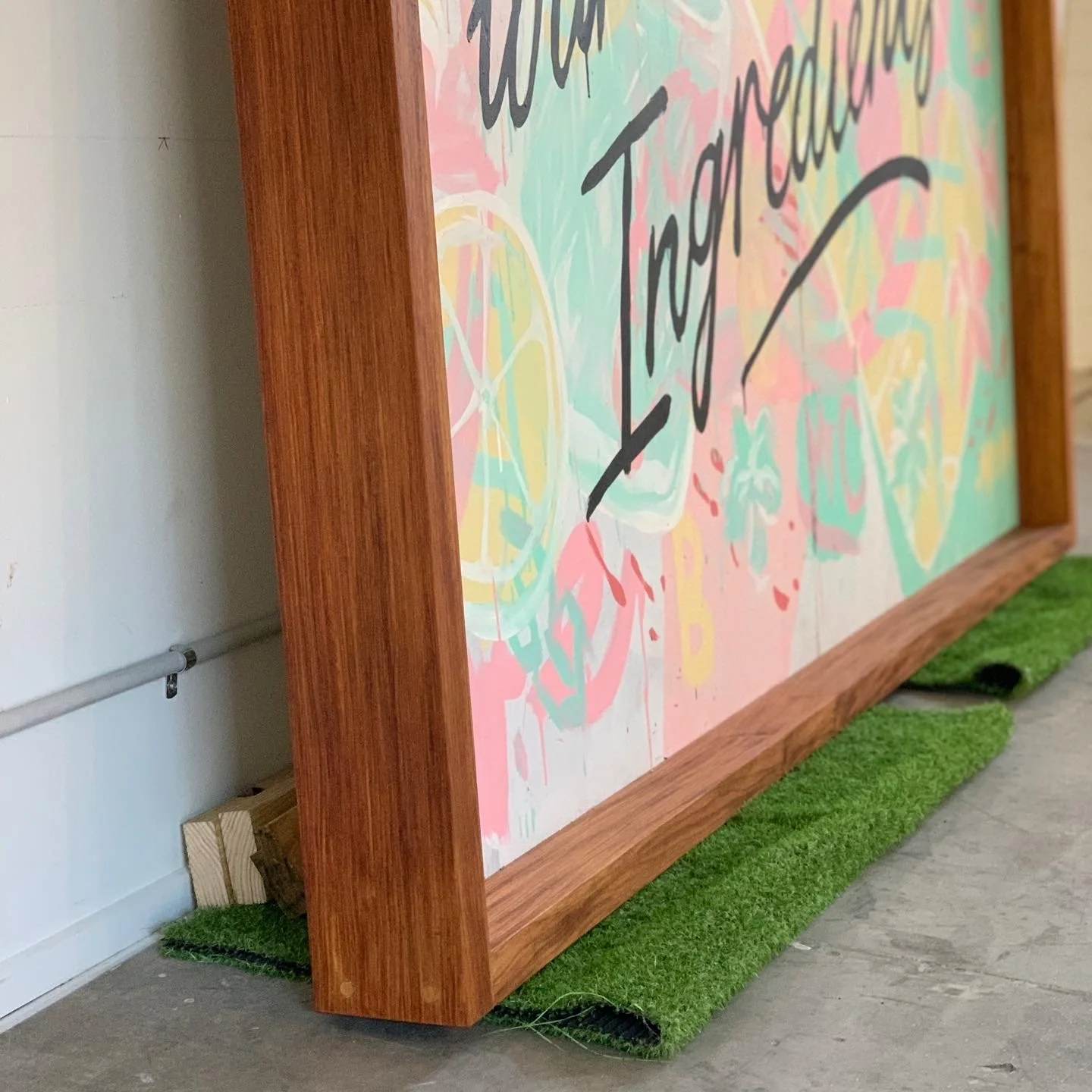 Custom Picture Frame for Mr. Consistent out of New-Guinea Rosewood. This was 2.4 metres x 2.4metres in size so needed to be assembled on site at the Mr.C headquarters in Burleigh. 