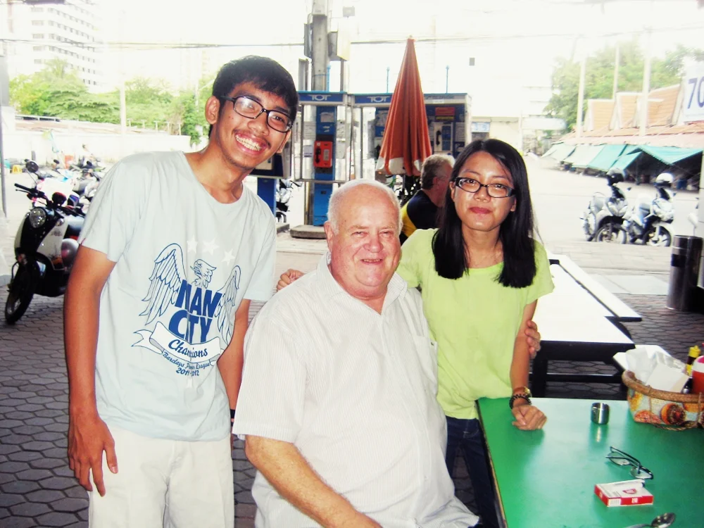 My brother and some friendly man we met and chatted with while having lunch at Pattaya
