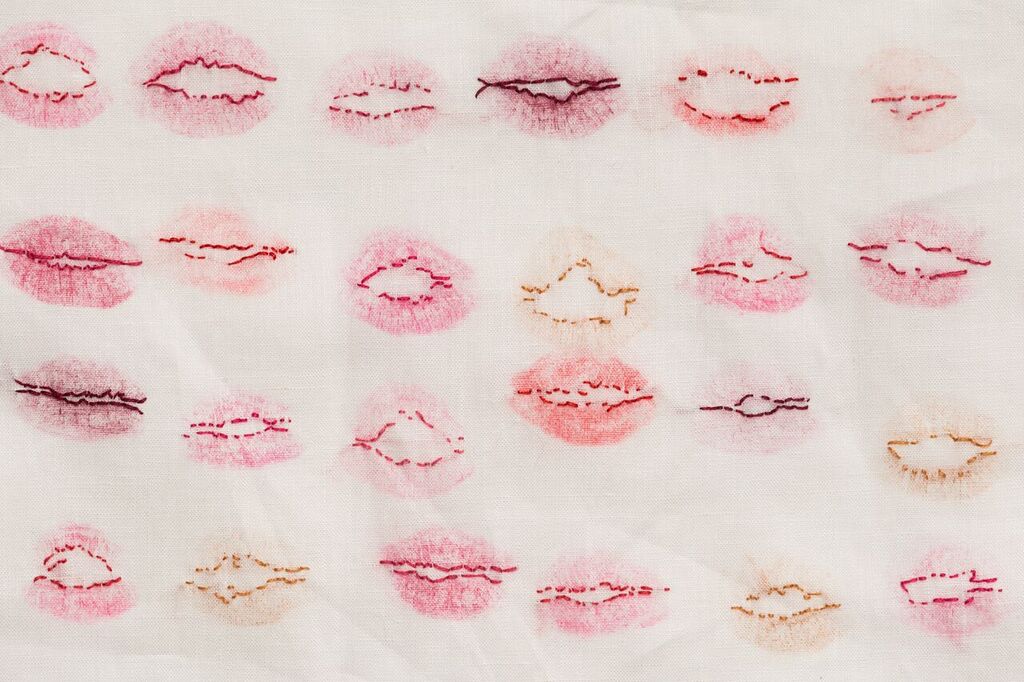 Christina Peek, The Kiss List (detail) , 2015, lipstick, cotton thread, linen, dimentions variable, photograph James Field, courtesy of Adelaide Central School of Art