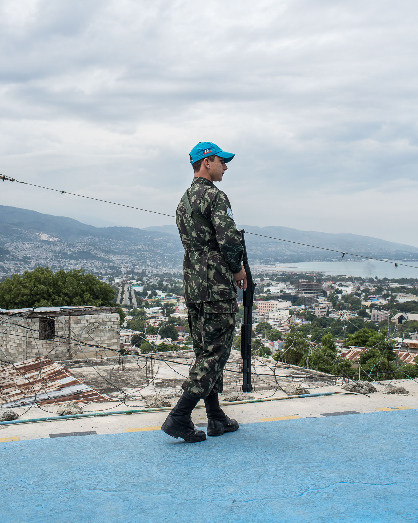  A UN peacekeeping soldier from Brazil, operating under the auspices of MINUSTAH, at his base in Fort National on Tuesday, December 16, 2014 in Port-au-Prince, Haiti. The UN has a controversial record in Haiti, and is extremely unpopular. 