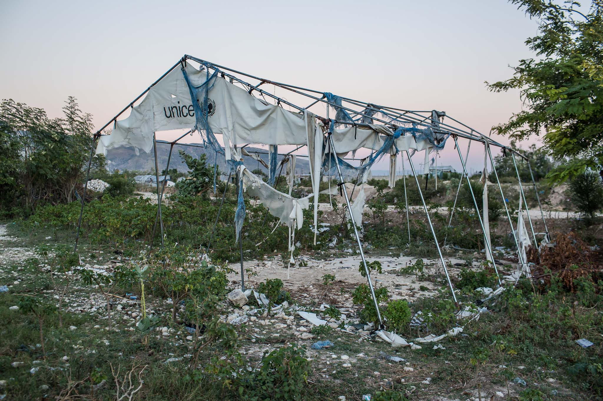  A tent donated by UNICEF which was formerly used as a church stands in tatters at the Corail-Cesselesse camp for people displaced by the 2010 earthquake on Saturday, December 20, 2014 in Port-au-Prince, Haiti. The camp is home to tens of thousands o