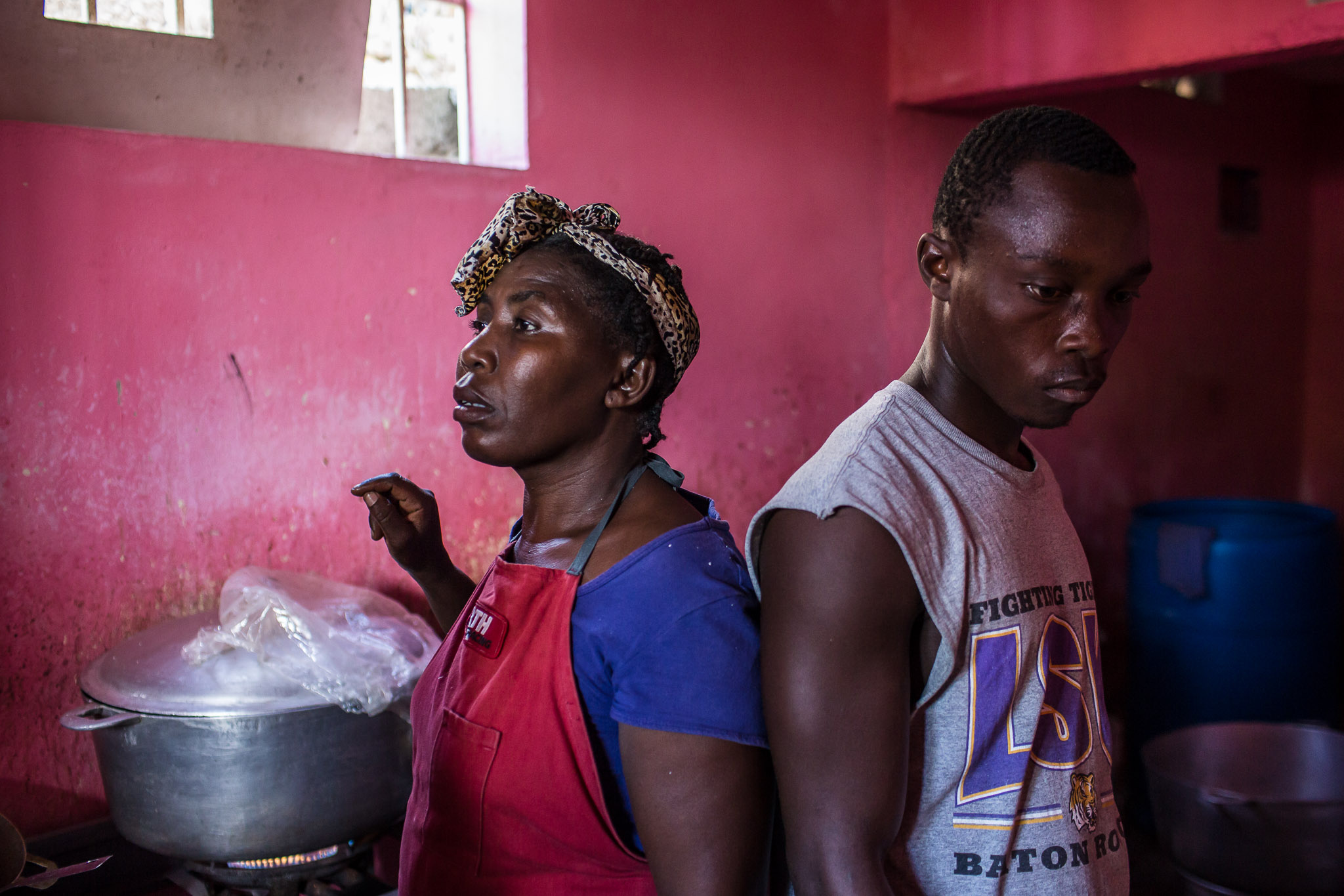  Kitchen workers at a restaurant in the Tapis Rouge neighborhood on Monday, December 22, 2014 in Port-au-Prince, Haiti. The restaurant was initially funded as a government program, and is required to serve meals that cost the equivalent of less than 