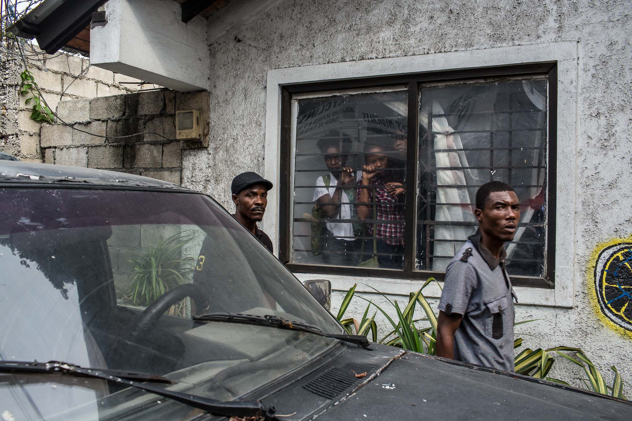  People march during an anti-government protest on Tuesday, December 16, 2014 in Port-au-Prince, Haiti. President Michel Martelly was elected in 2010 with great hope for reforms, but in the wake of slow recovery and parliamentary elections that are t