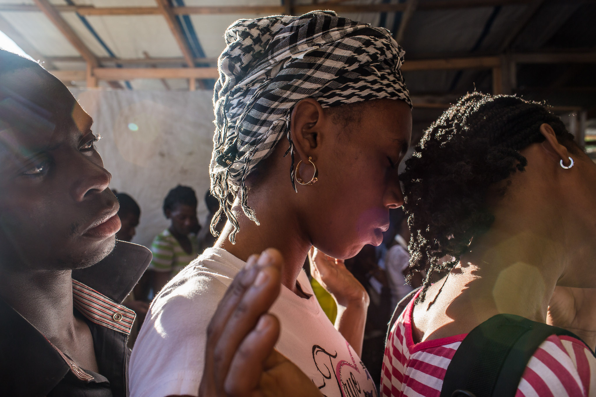  Worshipers at L'Eglise Evangelique Piscine de Bethesda, the church of televangelist Marcorel Zidor, on Saturday, December 20, 2014 in Port-au-Prince, Haiti. Pastor Zidor attracts a large audience with his emotional services and miracle medical cures