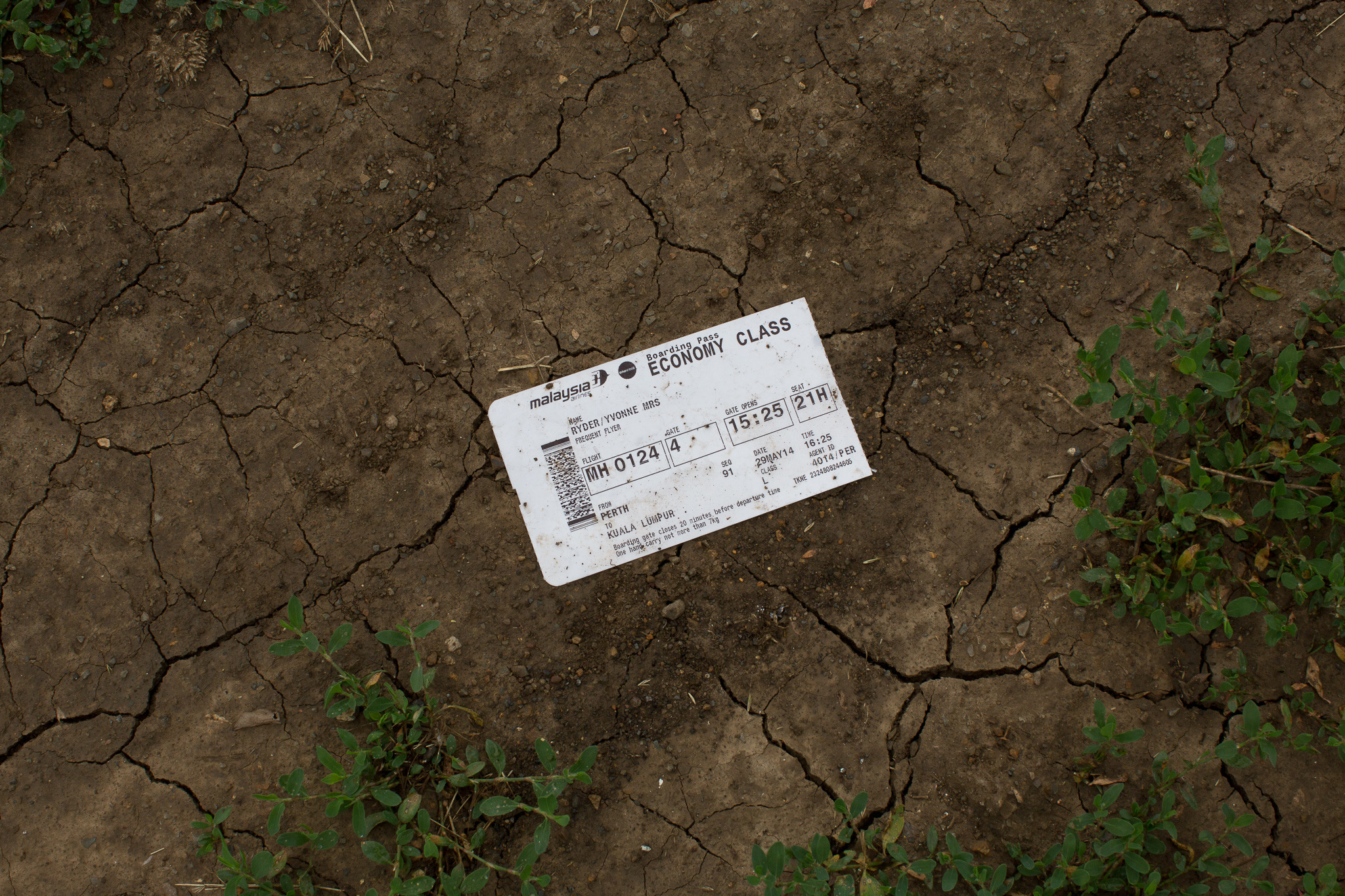  A boarding pass from a previous flight, belonging to a passenger on Malaysia Airlines flight MH17, on July 18, 2014 in Grabovo, Ukraine. Air Malaysia flight MH17 travelling from Amsterdam to Kuala Lumpur has crashed on the Ukraine/Russia border near