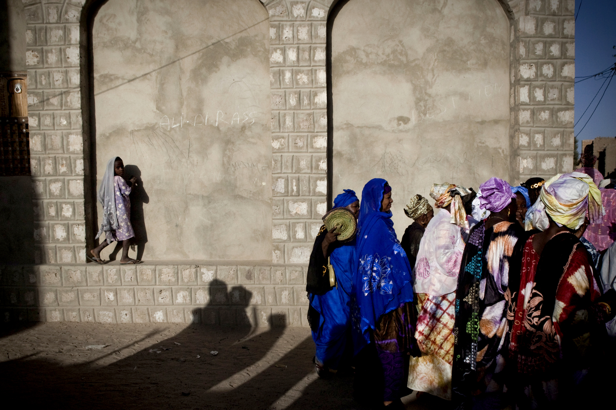  Women gather in the streets of Timbuktu, Mali on a Sunday afternoon to celebrate a three day wedding. by Katie Orlinsky. 