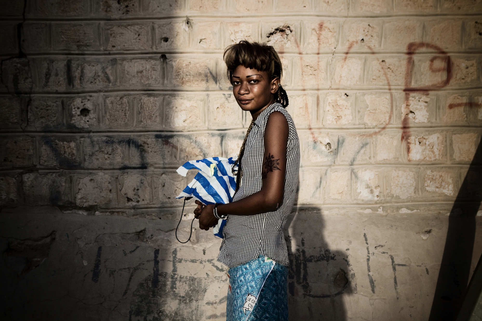  TIMBUKTU, Mali. OCTOBER 2013. Badje Sosandis from Timbuktu, Mali. The seventeen year old returned to Mali this past October after after fleeing the conflict. Mali, a predominantly Muslim country, has been known for it�s vibrant culture, rich ancient