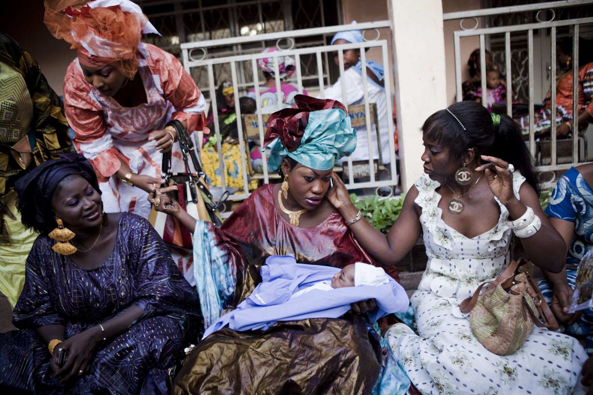  Bamako, Mali. SEPTEMBER 2013. A baby naming ceremony in Bamako, Mali. Mali, a predominantly Muslim country, has been known for it�s vibrant culture, rich ancient Islamic history, religious tolerance and joyful music and dance. Yet much of this cultu