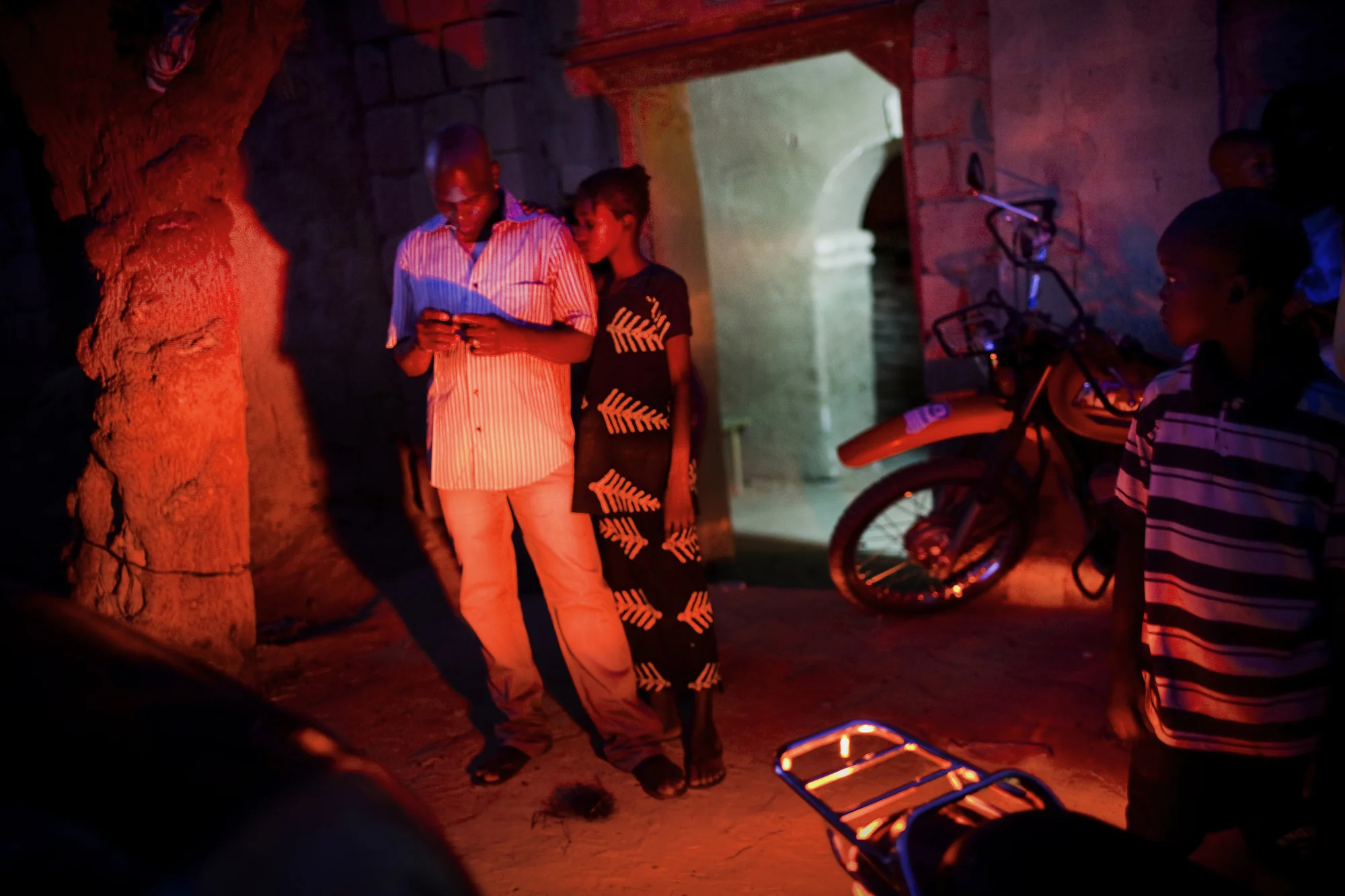 TIMBUKTU, Mali. OCTOBER 2013. Night falls in Timbuktu, Mali.
Summary: Mali, a predominantly Muslim country, has been known for it�s vibrant culture, rich ancient Islamic history, religious tolerance and joyful music and dance. Yet much of this culture was at risk of permanent destruction when militant Islamist rebels took over Northern Mali in 2012. The rebels imposed their own despotic version of religious Islamic law and women bore the brunt of the crackdown. Many women fled, while some remained in the confines of their homes for over a year. In the spring of 2013 the French army entered Mali and defeated the Islamist militias. Photo by Katie Orlinsky.