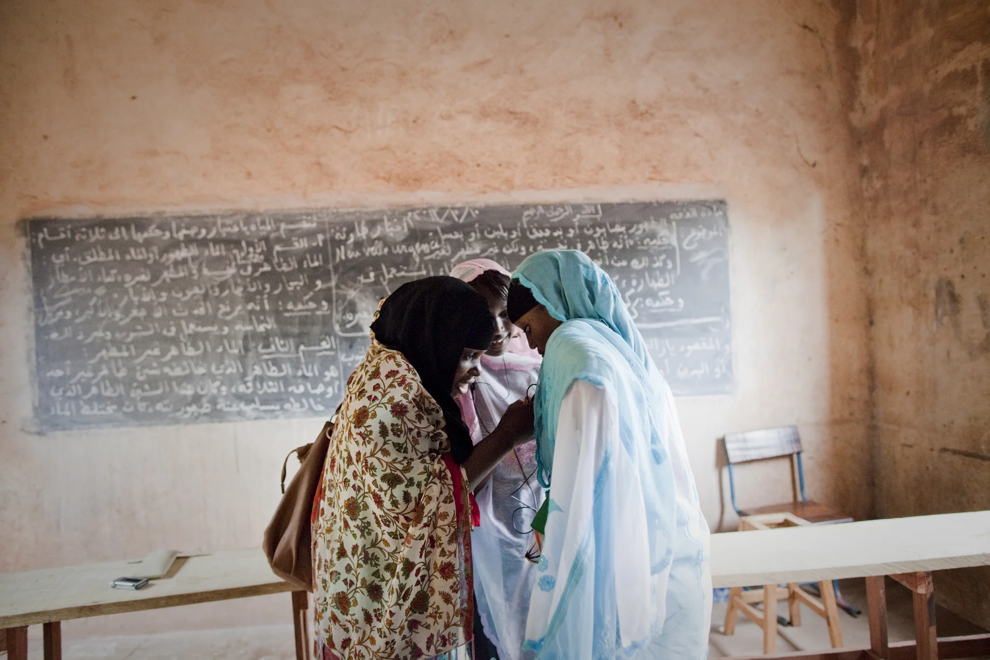 Bamako, Mali. OCTOBER 2013. A co-ed Islamic school in Bamako, Mali. Mali, a predominantly Muslim country, has been known for it�s vibrant culture, rich ancient Islamic history, religious tolerance and joyful music and dance. Yet much of this culture was at risk of permanent destruction last year when militant Islamist rebels took over Northern Mali from 2011-2012. The rebels imposed their own despotic version of religious Islamic law and women bore the brunt of the crackdown. Many women fled, while some remained in the confines of their homes for over a year. In the spring of 2013 the French army entered Mali and defeated the Islamist militias. (Photo by Katie Orlinsky/Getty Images)