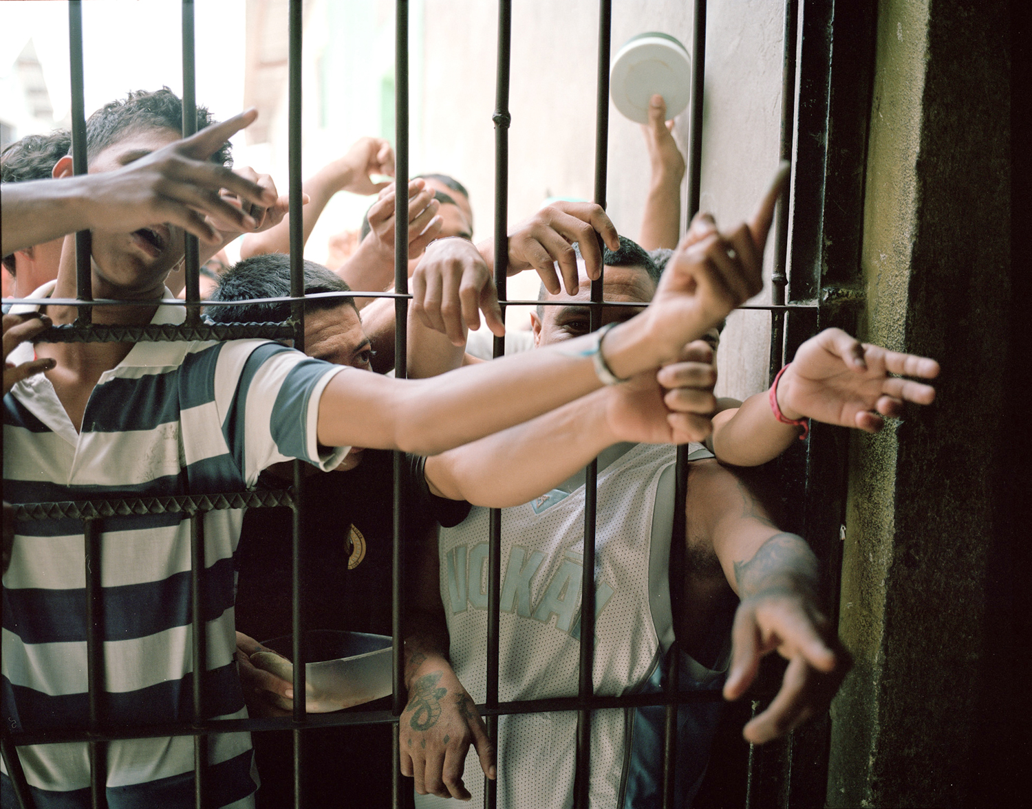  Prisoners beg church members for deodorant bars in the Comayagua Prison, where in 2012 a fire killed 360 people. 