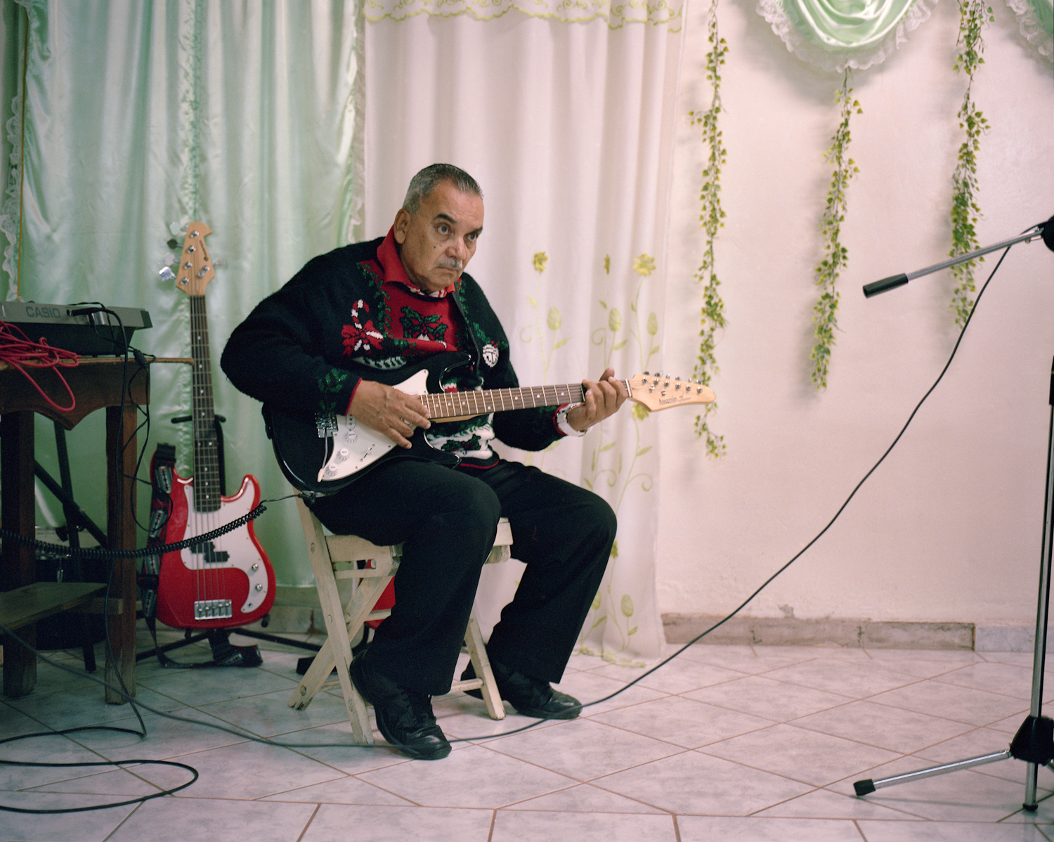  A man plays for a church group in Tegucigalpa. 