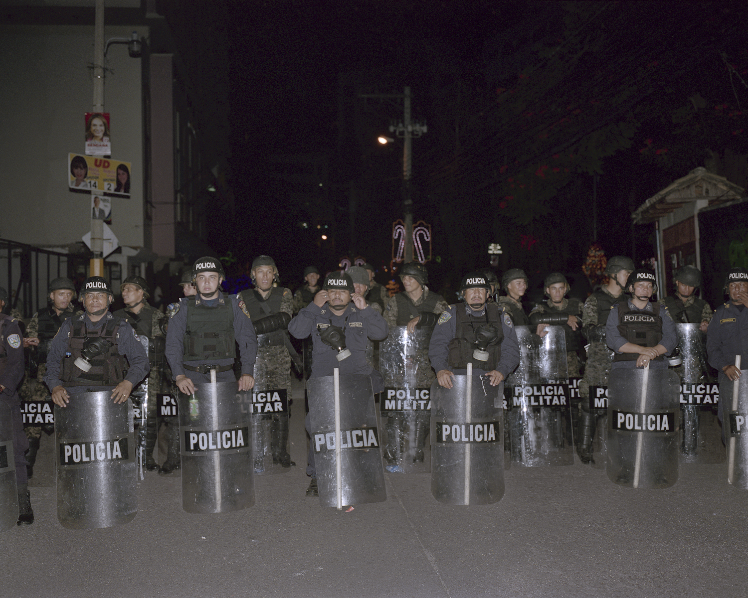  Riot Police wait for protestors to leave. 