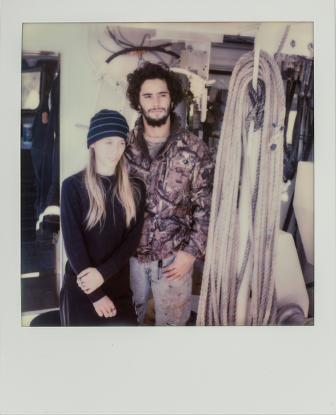From left, fishermen Daisy Moore, 21, and her boyfriend Jake Cressionie, 20, pose for a portrait onboard the Anna Marie shrimp boat in Louisiana. (Dominic Bracco II / Prime for WWF Magazine)