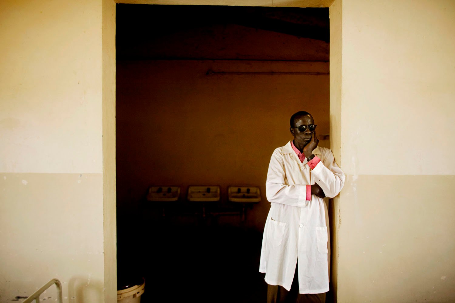  A southern Sudanese doctor looks out over the male surgical recovery ward the main hospital in Bentiu, the capital of southern Sudan's oil rich Unity State. The state of medical care in  the south is dismal with too few, understaffed hospitals tryin
