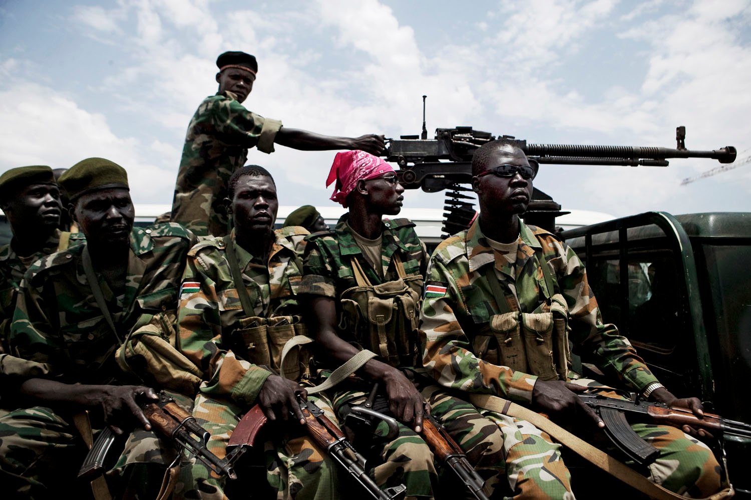  Heavily armed members of the Sudan People's Liberation Army, the main rebel movement that battled northern Sudanese forces from 1983-2005. Now functioning as the national army, the SPLA struggles to transform from a guerilla to a professional fighti