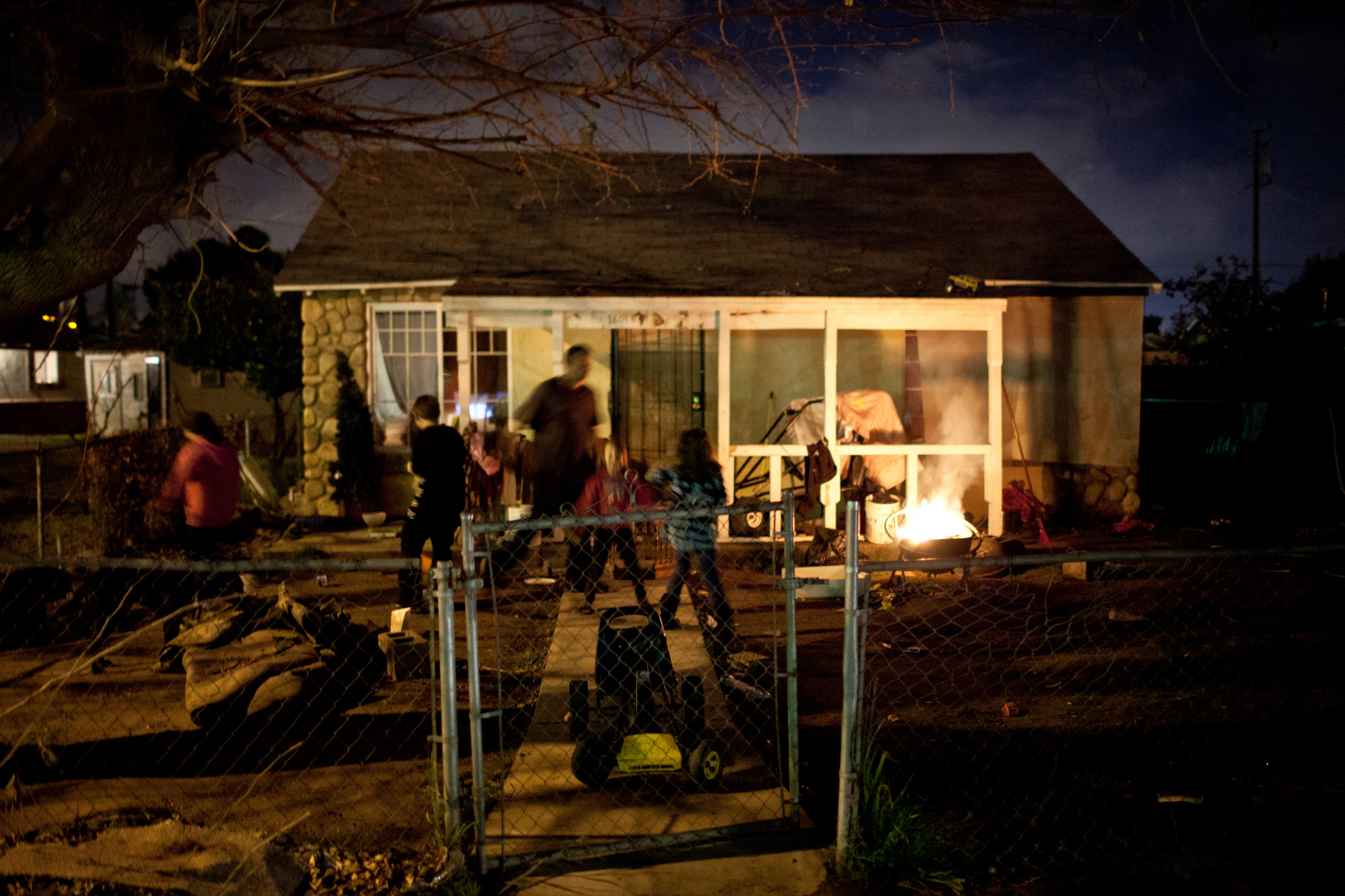  The Rutter family hangs out in front of their Parklawn home in Modesto, California. Across California there are hundreds of unincorporated communities like Parklawn. While a few are some of the state's richest areas; most lack sewer systems, clean d