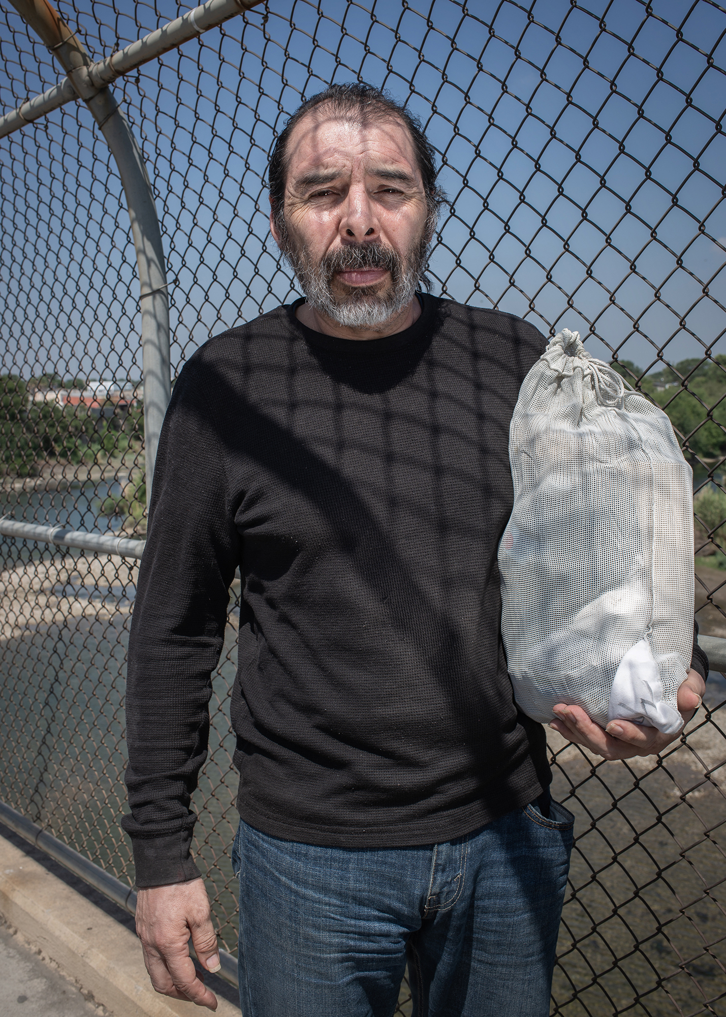  Portrait of Jesus Aragones Varal (52 years old) while crossing the Del Río / Ciudad Acuña International Bridge after being deported.  He had lived 19 years old in the United States, and had to leave his wife and son behind. Every Saturday morning a 