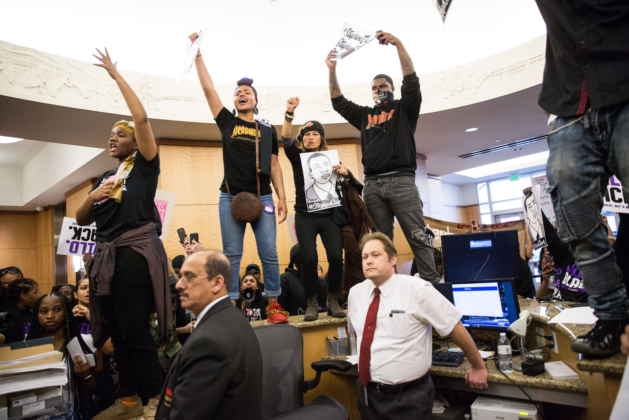  Protestors take over City Hall during a city council meeting on the police shooting of Stephon Clark. 