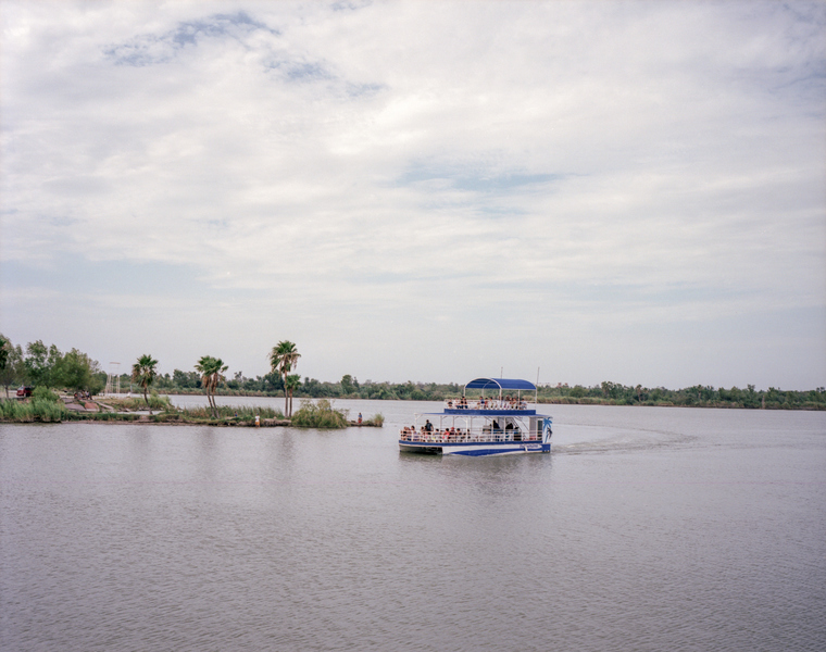  A Mexican tour boat takes tourists out on the Rio Bravo.  