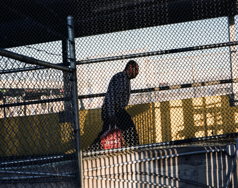  A man crosses from Brownsville, Texas to Matamoros, Mexico.  